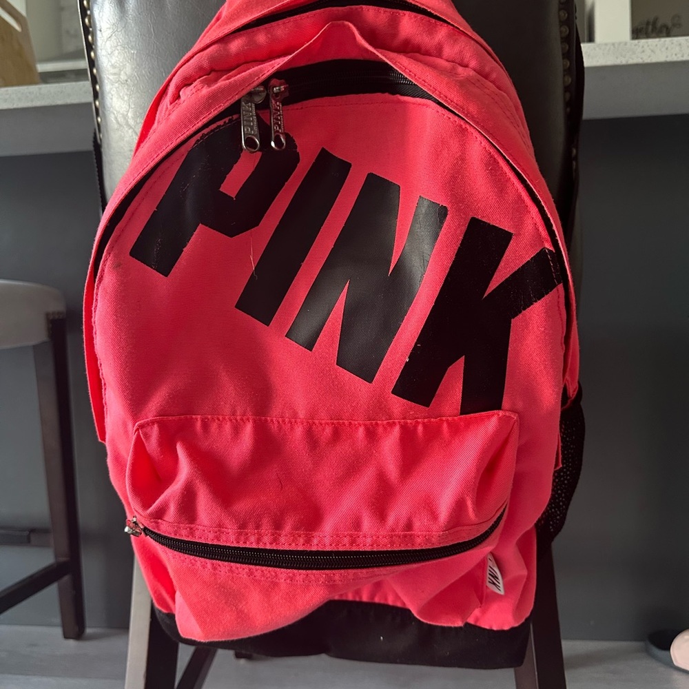 Pink Backpack with Bold Lettering